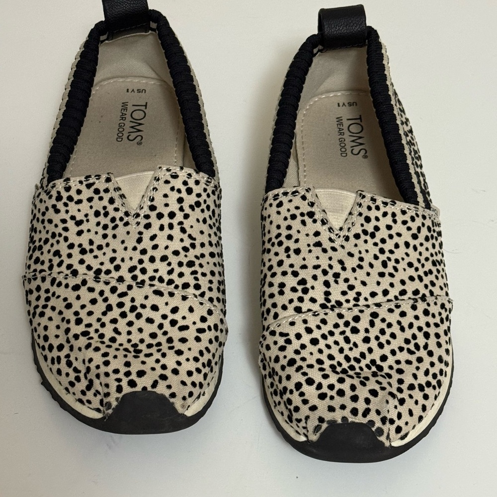 Toms Black and White Moccasin Slip-Ons